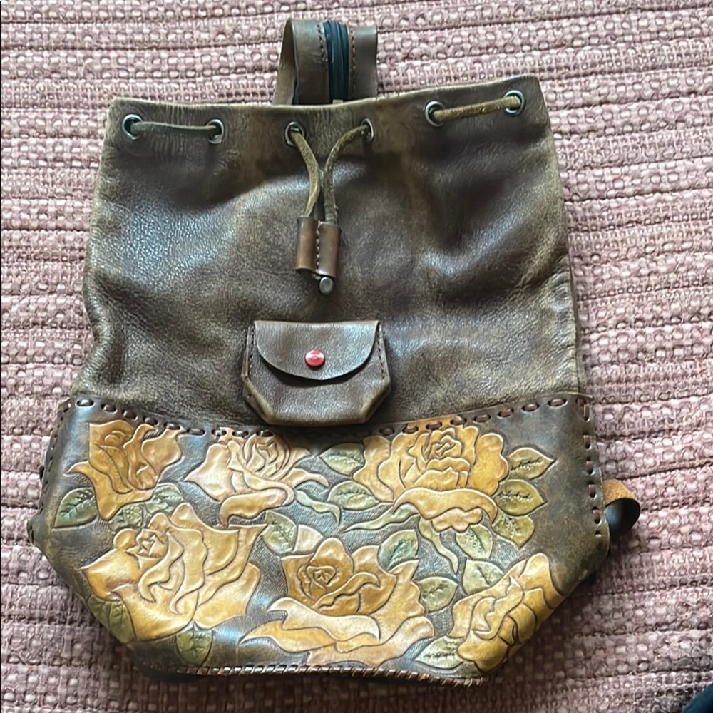 Vintage leather hand-tooled bucket bag/backpack